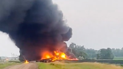 This photo provided by Doug Zink, smoke fills the sky after a train derailment on Friday, July 5, 2024 near Carrington, N.D.