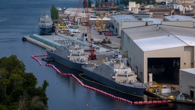 Ships under construction sit docked at Fincantieri Marinette Marine.