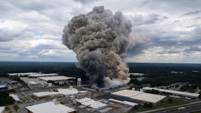 Smoke billows from a fire at the BioLab facility in Conyers, Ga., Sunday, Sept. 29, 2024.