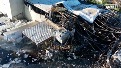 This image taken from video from WHAS 11 News shows damage after an explosion injured multiple employees at Givaudan Sense Color, Tuesday, Nov. 12, 2024, in Louisville, Ky.