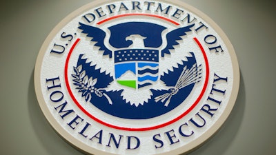 The Department of Homeland Security logo is seen during a news conference in Washington, Feb. 25, 2015.