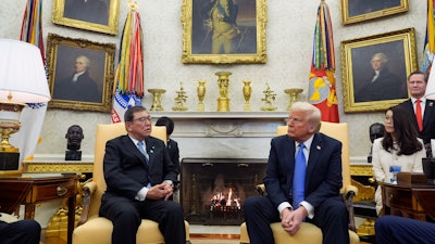 President Donald Trump speaks with Japanese Prime Minister Shigeru Ishiba in the Oval Office of the White House, Friday, Feb. 7, 2025, in Washington.