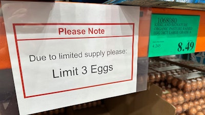 A sign notes the limitation on the purchase of flats of eggs in a Costco warehouse Tuesday, Feb. 18, 2025, in Sheridan, Colo.