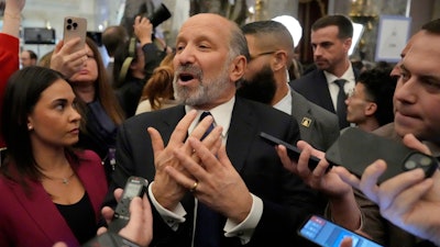 Secretary of Commerce Howard Lutnick speaks with reporters after President Donald Trump addressed a joint session of Congress at the Capitol in Washington, Tuesday, March 4, 2025.