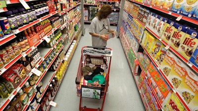 A woman looks at products in the aisle of a store in Waco, Texas, Dec. 14, 2010.