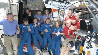 This image made from video by NASA shows astronauts greeting each other after a SpaceX capsule docked with the International Space Station, Sunday, March 16, 2025. Top row from left: Nick Hague, Alexander Gorbunov, Suni Williams, Alexei Ovchinin and Ivan Vagner. Bottom row from left: Butch Wilmore, Takuya Onishi, Anne McClain, Kirill Peskov, Nichole Ayers and Don Pettit.