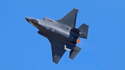 U.S. Air Force fighter aircraft F-35 performs aerobatic maneuvers on the third day of the Aero India 2025, a biennial event, at Yelahanka air base in Bengaluru, India, Wednesday, Feb. 12, 2025.