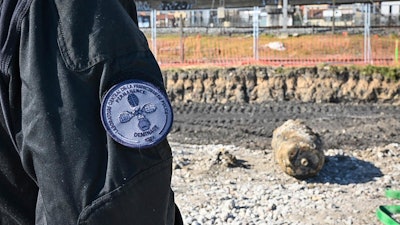 This photo provided by the Paris Police Prefecture shows a huge unexploded World War II-era bomb that caused transportation chaos in Paris, that included the suspension of high-speed rail links with London and Brussels and the closure of a vital road artery in the French capital Friday, March 7, 2025 in Saint-Denis, outside Paris.