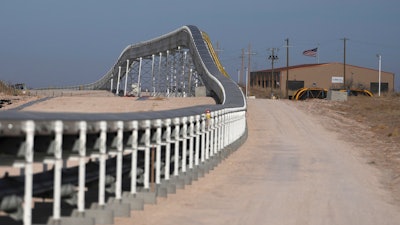 A 42-mile conveyor belt by Atlas Energy carries sand needed for hydraulic fracturing Wednesday, Feb. 26, 2025, in Kermit, Texas.