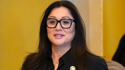 Former Rep. Lori Chavez-DeRemer, R-Ore., President-elect Donald Trump's pick for Secretary of Labor, left, is pictured on Capitol Hill, Jan. 14, 2025, in Washington.