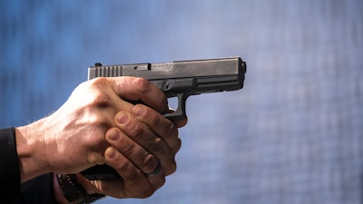 A semi-automatic Glock pistol is fired at the Bureau of Alcohol, Tobacco, Firearms, and Explosives (ATF), National Services Center, March 2, 2023, in Martinsburg, W.Va.