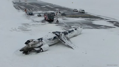 This image taken from video released by the Transportation Safety Board of Canada on Wednesday, Feb. 19, 2025, shows the crashed plane of Delta flight 4819 at Toronto Pearson International Airport, in Mississauga, Ontario, on Tuesday, Feb. 18.