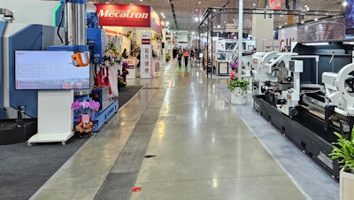 Spectators observe booths at TIMTOS 2025 in Taipei, Taiwan.